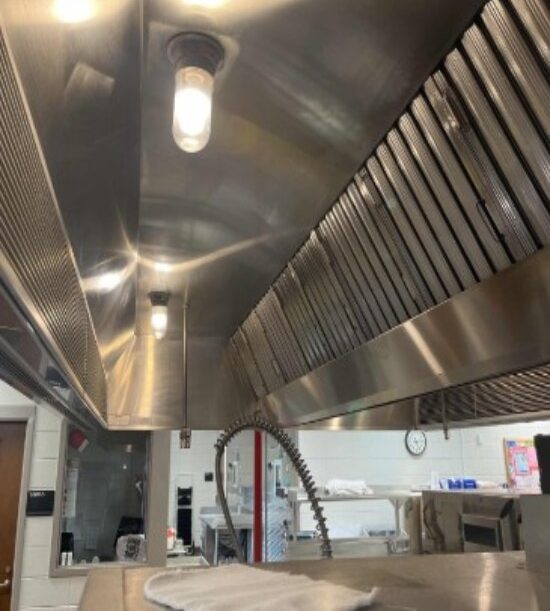 Modern hotel hood system installed over a commercial cooking area in Georgia & North Carolina